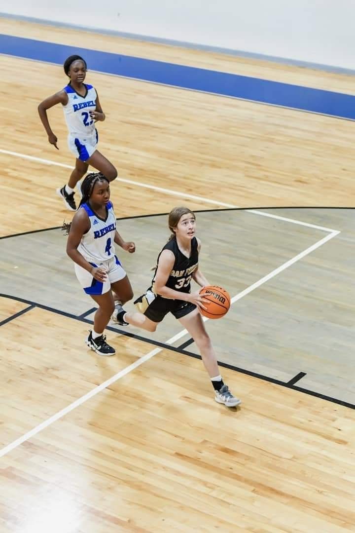 Kali Hinson driving to the basket